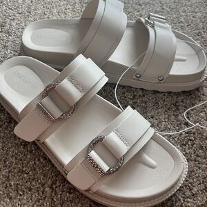 NEVER BEEN WORN. Slide sandals. Women’s 8.5